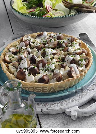 Stock Photography - Onion mushroom and feta flan. Fotosearch