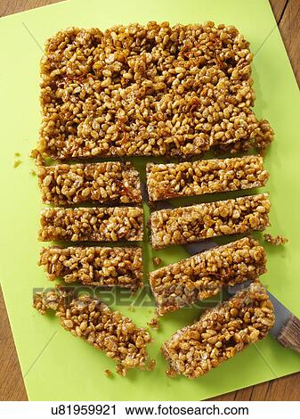 Stock Image - Orange rice crispies. Fotosearch