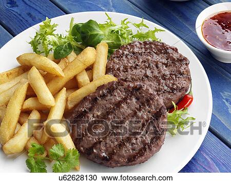 Oriental burgers and chips View Large Photo Image Stock Image - Oriental burgers and chips. Fotosearch