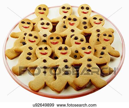 Party Table With Plate Full Of Gingerbread Men Biscuits Or Cookies On White Cut Out View Large Photo Image Stock Photo - Party Table With Plate Full Of Gingerbread Men Biscuits Or Cookies On White Cut Out. Fotosearch