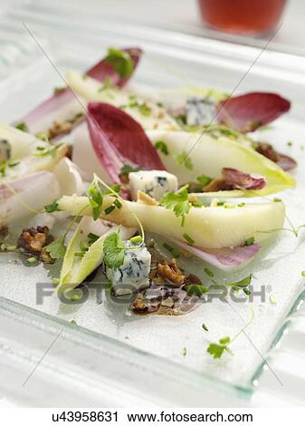 Pear endive salad with Gorgonzola cheese and walnuts View Large Photo Image Stock Image - Pear endive salad with Gorgonzola cheese and walnuts. Fotosearch