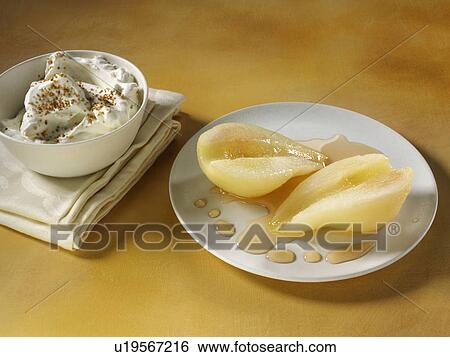 Pears in rum with whipped cream dusted with sucanat drizzled with poaching liquor View Large Photo Image Stock Photograph - Pears in rum with whipped cream dusted with sucanat drizzled with poaching liquor. Fotosearch