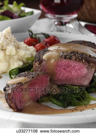 Peppered fillet steak with celeriac puree Marco Pierre White recipe View Large Photo Image Stock Photo - Peppered fillet steak with celeriac puree Marco Pierre White recipe. Fotosearch