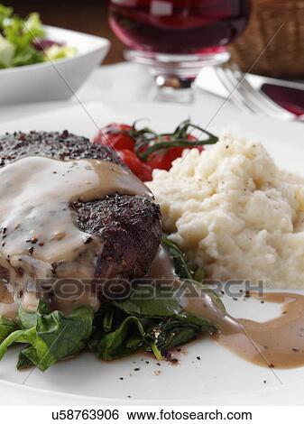 Peppered fillet steak with celeriac puree Marco Pierre White recipe View Large Photo Image Stock Photograph - Peppered fillet steak with celeriac puree Marco Pierre White recipe. Fotosearch