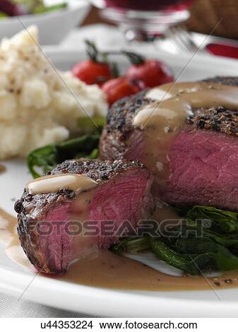 Peppered fillet steak with spinach and celeriac puree Marco Pierre White recipe View Large Photo Image Picture - Peppered fillet steak with spinach and celeriac puree Marco Pierre White recipe. Fotosearch