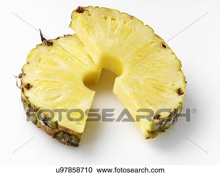 Pineapple slices on a white background View Large Photo Image Stock Image - Pineapple slices on a white background. Fotosearch