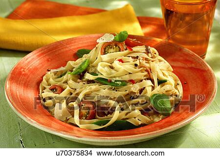 Plate Of Fettuccine With Anchovies And Basil View Large Photo Image Picture - Plate Of Fettuccine With Anchovies And Basil. Fotosearch
