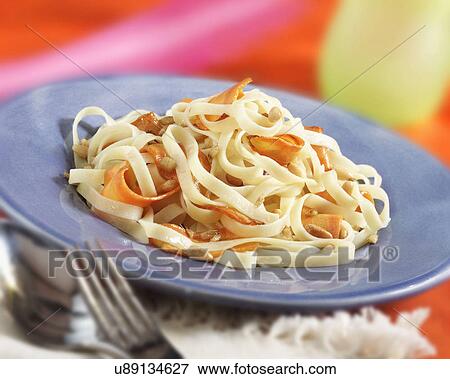 Plate Of Fettuccine With Carrots View Large Photo Image Stock Photo - Plate Of Fettuccine With Carrots. Fotosearch