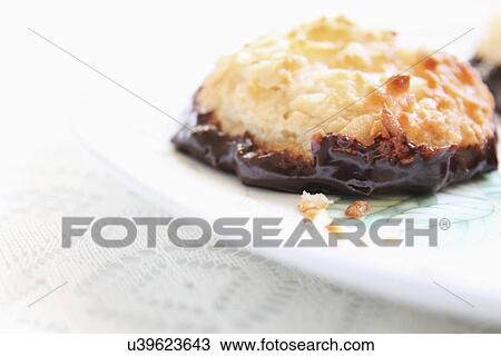 Stock Image - Plate Of Homemade Coconut Macaroons. Fotosearch