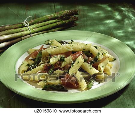 Stock Image - Plate Of Homemade Penne With Asparagus And Ham. Fotosearch