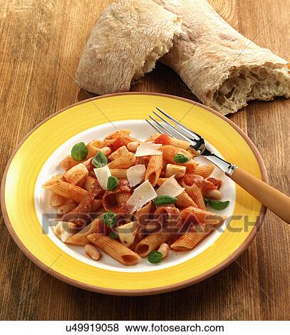 Plate Of Homemade Penne With Parmigiani And Basil View Large Photo Image Stock Photo - Plate Of Homemade Penne With Parmigiani And Basil. Fotosearch