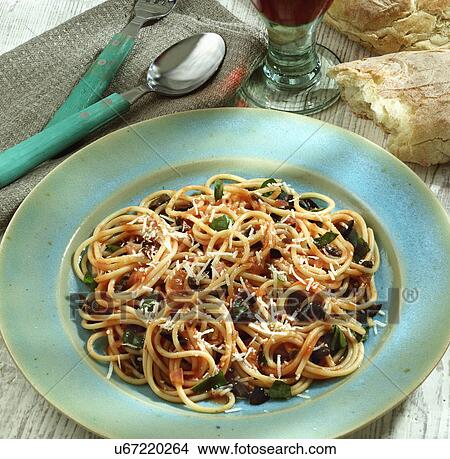 Picture - Plate Of Homemade Spaghetti With Tomato And Olives. Fotosearch