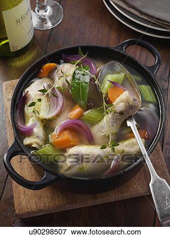 Stock Photo - Poached chicken legs. Fotosearch