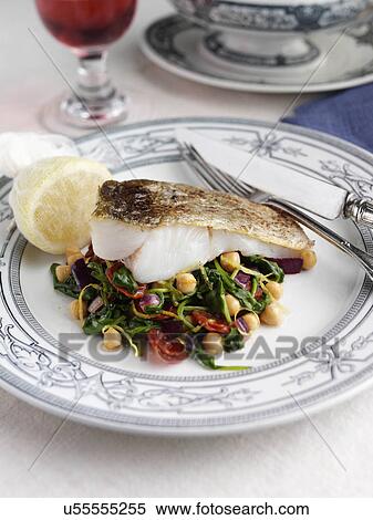 Pollock or pollack with garbanzo beans and spinach View Large Photo Image Stock Photography - Pollock or pollack with garbanzo beans and spinach. Fotosearch