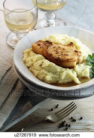 Pork Chop Served With Mashed Potato View Large Photo Image Stock Photo - Pork Chop Served With Mashed Potato. Fotosearch