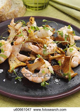 Prawns and girolle mushrooms View Large Photo Image Stock Photo - Prawns and girolle mushrooms. Fotosearch