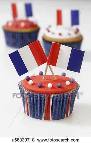 Red And White Iced Cupcakes With French Flags On Top View Large Photo Image Stock Photo - Red And White Iced Cupcakes With French Flags On Top. Fotosearch