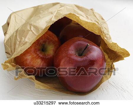 Red Chief apples in a brown paper bag View Large Photo Image Stock Photo - Red Chief apples in a brown paper bag. Fotosearch