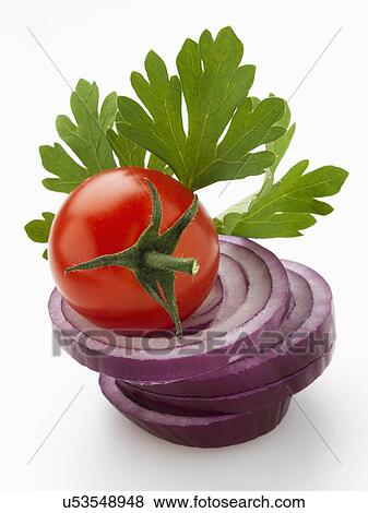 Red ripe cherry tomato red onion slices and parsley on a white background View Large Photo Image Stock Photo - Red ripe cherry tomato red onion slices and parsley on a white background. Fotosearch