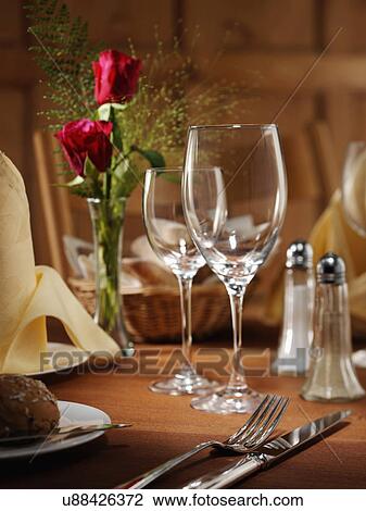 Stock Image - Restaurant table setting. Fotosearch