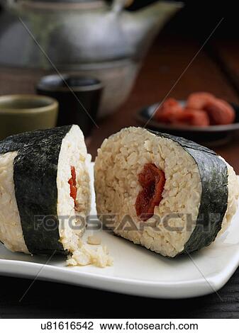 Stock Image - Rice ball wrapped in seaweed. Fotosearch