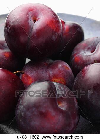 Ripe plums close up View Large Photo Image Stock Image - Ripe plums close up. Fotosearch