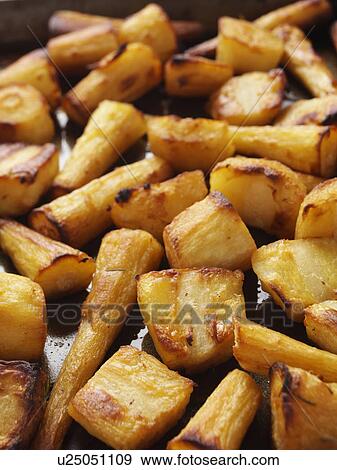 Roast parsnips View Large Photo Image Stock Photo - Roast parsnips. Fotosearch
