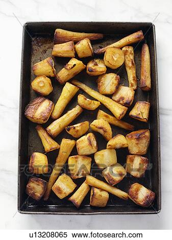 Stock Photography - Roast parsnips. Fotosearch