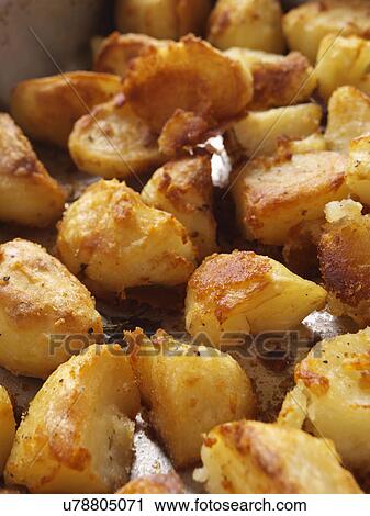 Roast potatoes View Large Photo Image Stock Image - Roast potatoes. Fotosearch