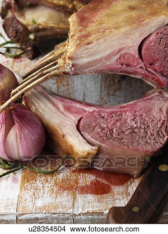 Roast rack of lamb View Large Photo Image Picture - Roast rack of lamb. Fotosearch