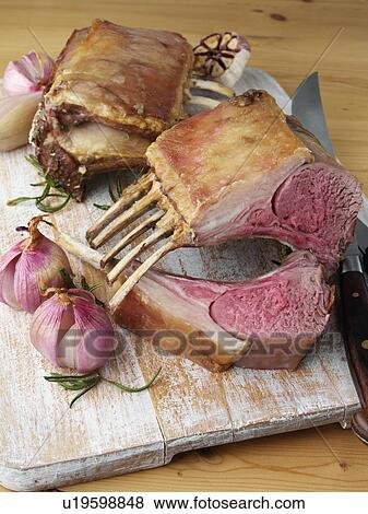 Stock Photo - Roast rack of lamb. Fotosearch