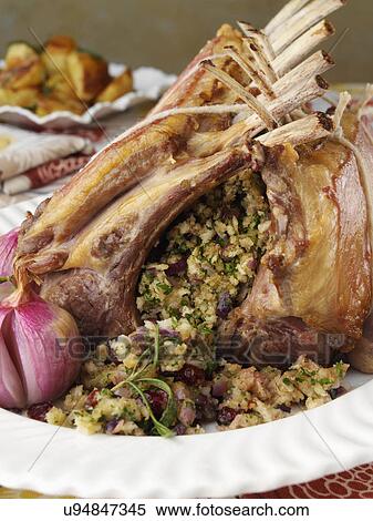 Roast rack of lamb View Large Photo Image Stock Photography - Roast rack of lamb. Fotosearch