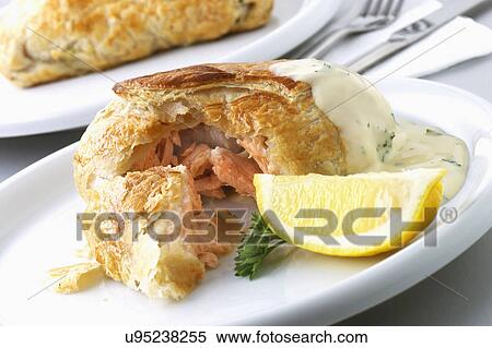 Salmon En Croute Served On Plate With Lemon View Large Photo Image Stock Photography - Salmon En Croute Served On Plate With Lemon. Fotosearch