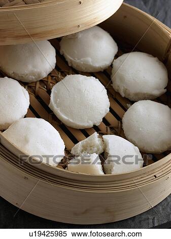Sannas Goan rice bread in a bamboo steamer View Large Photo Image Stock Photography - Sannas Goan rice bread in a bamboo steamer. Fotosearch