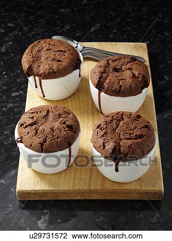 Saucy chocolate pudding indulgent dessert View Large Photo Image Stock Image - Saucy chocolate pudding indulgent dessert. Fotosearch