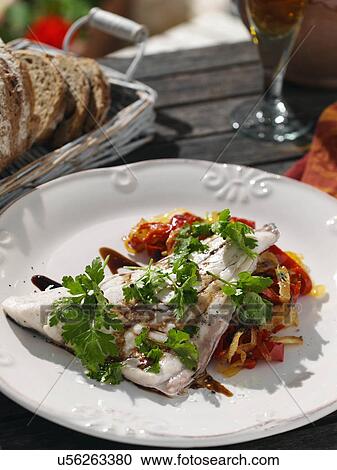 Stock Image - Sea bream with piperade. Fotosearch