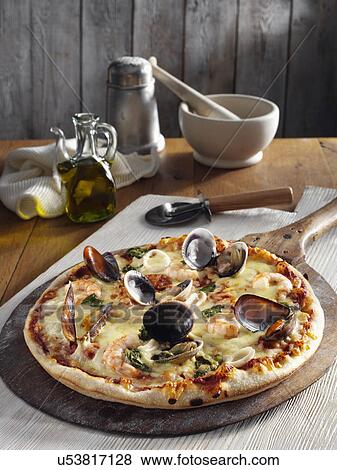 Stock Photo - Seafood pizza. Fotosearch
