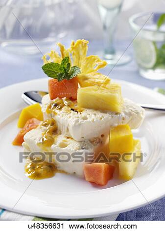 Stock Image - Semifreddo with tropical fruit. Fotosearch