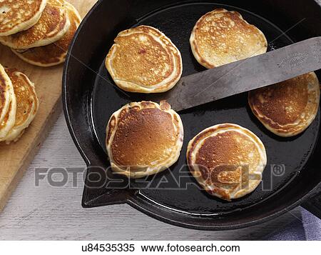 Silver dollar ginger snap Huckelberry pancakes View Large Photo Image Stock Photography - Silver dollar ginger snap Huckelberry pancakes. Fotosearch