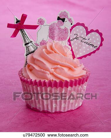 Single French Or Parisian Style Cupcake In Pink Paper Case With Piped Pink Butter Cream Icing, With Toppers Of Eiffel Tower, Parisian White Poodle And Heart With Words Je T'Aime- I Love You, On Pink View Large Photo Image Stock Image - Single French Or Parisian Style Cupcake In Pink Paper Case With Piped Pink Butter Cream Icing, With Toppers Of Eiffel Tower, Parisian White Poodle And Heart With Words Je T'Aime- I Love You, On Pink. Fotosearch