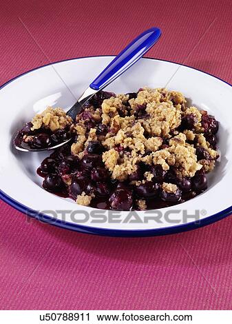 Single Serving Of Blueberry Crumble In Dish With Ice Cream Topping View Large Photo Image Stock Image - Single Serving Of Blueberry Crumble In Dish With Ice Cream Topping. Fotosearch