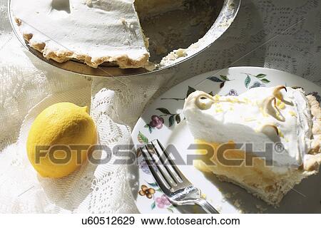 Stock Photo - Slice Of Homemade Lemon Meringue Pie. Fotosearch