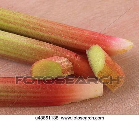 Sliced Stalks Of Rhubarb On Wooden Surface View Large Photo Image Stock Photo - Sliced Stalks Of Rhubarb On Wooden Surface. Fotosearch