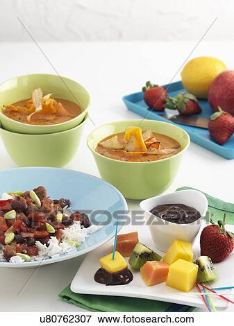 Slow cooker dishes View Large Photo Image Stock Photo - Slow cooker dishes. Fotosearch