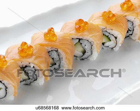 Stock Photo - Smoked salmon sushi with rice. Fotosearch
