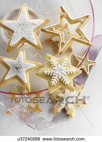 Star shaped iced Christmas biscuits View Large Photo Image Stock Photo - Star shaped iced Christmas biscuits. Fotosearch