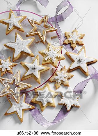 Star shaped iced Christmas biscuits View Large Photo Image Stock Photo - Star shaped iced Christmas biscuits. Fotosearch