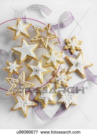 Star shaped iced Christmas biscuits View Large Photo Image Stock Photo - Star shaped iced Christmas biscuits. Fotosearch