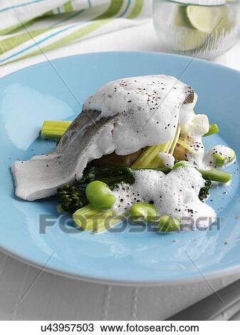 Steamed cod sprouting broccoli new potatoes broad beans leeks and cappuccino sauce View Large Photo Image Stock Image - Steamed cod sprouting broccoli new potatoes broad beans leeks and cappuccino sauce. Fotosearch