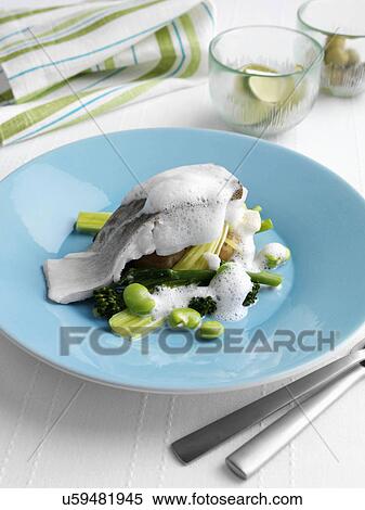 Steamed cod sprouting broccoli new potatoes broad beans leeks and cappuccino sauce View Large Photo Image Stock Photography - Steamed cod sprouting broccoli new potatoes broad beans leeks and cappuccino sauce. Fotosearch